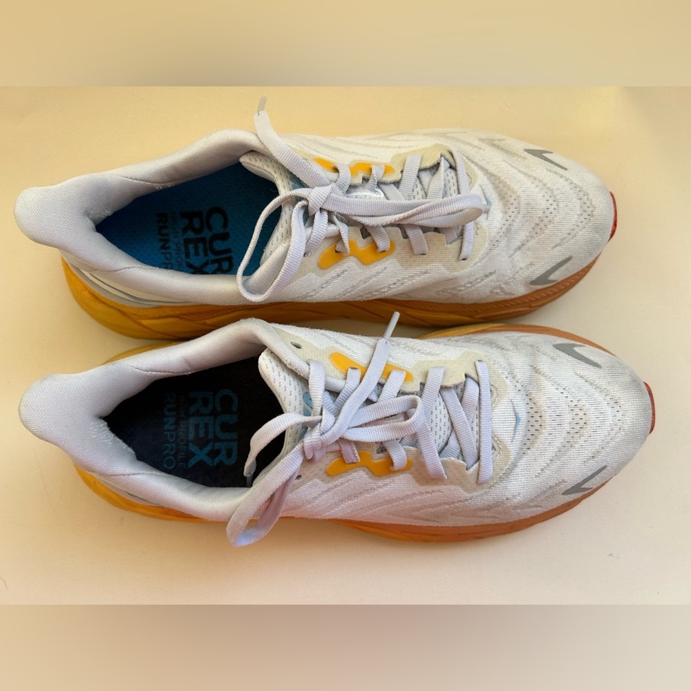 Hoka White Mesh Running Shoes with Yellow-Orange Gradient Midsole - Picture 2 of 8
